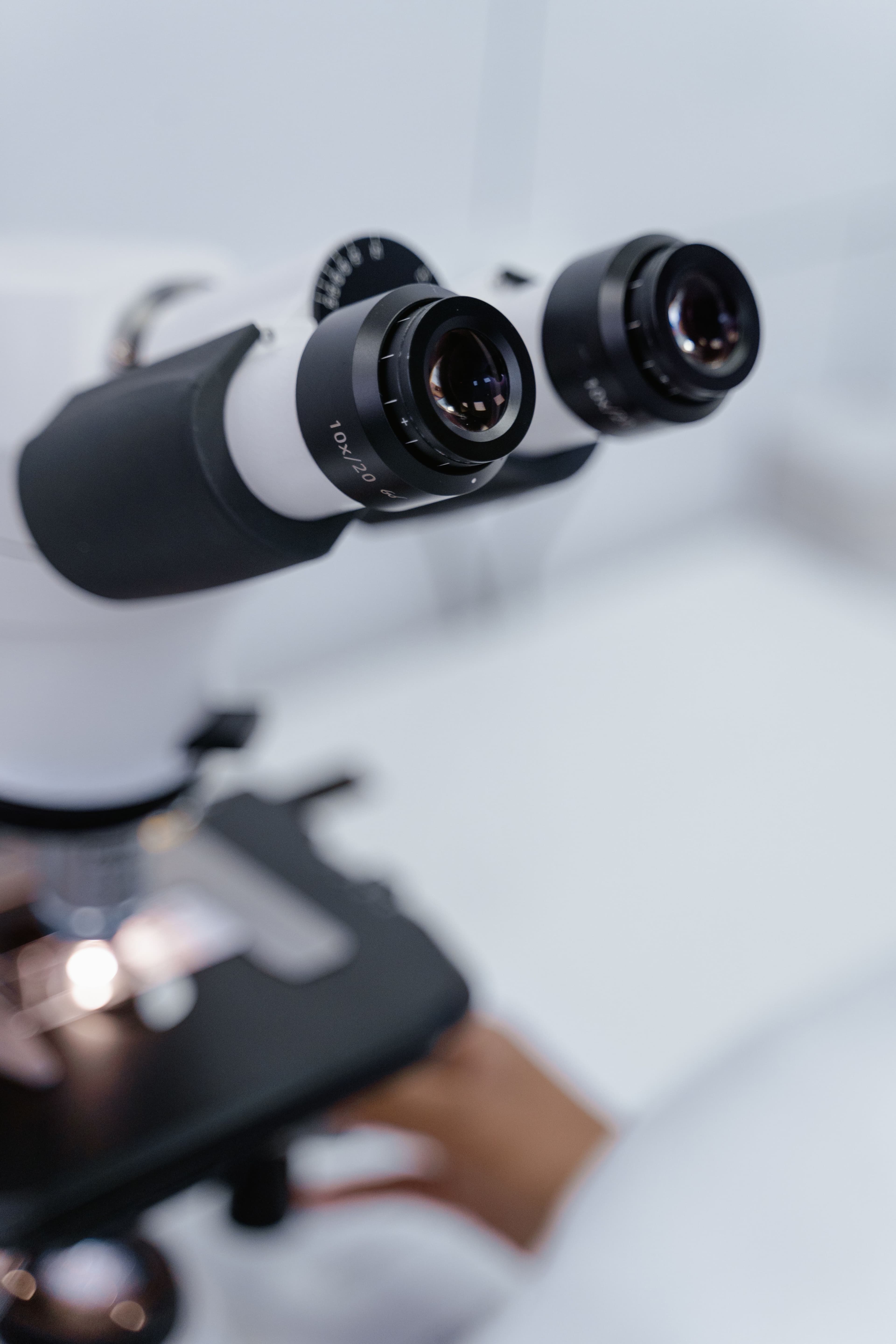 Close-up of a laboratory microscope and its eyepieces